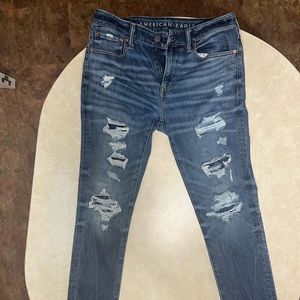 This is a mens American eagle outfitters ripped skinny jeans.